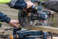 Carpenter using circular saw in DIY project. Royalty Free Stock Photo