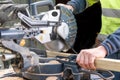 Carpenter using circular saw in DIY project. Royalty Free Stock Photo