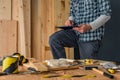 Carpenter using digital tablet in small business woodwork workshop Royalty Free Stock Photo