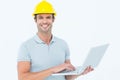 Carpenter using laptop over white background