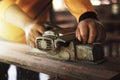 Carpenter is using tools to clear the wood, straighten the wood Royalty Free Stock Photo