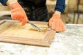 Carpenter using a wood gouge