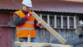 Carpenter with a wood piece