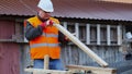 Carpenter with a wooden board