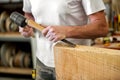 Carpenter or woodworker working with a chisel Royalty Free Stock Photo