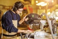 Carpenter work with mitre saw in factory Royalty Free Stock Photo