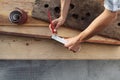 carpenter work the wood, measuring with meter and pencil old rustic wooden boards, top view background Royalty Free Stock Photo