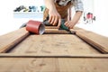 Carpenter work the wood with the rotary tool Royalty Free Stock Photo