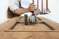 Carpenter work the wood with the sander grinding electric tools Royalty Free Stock Photo