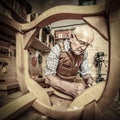 Carpenter at work in workshop