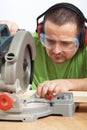 Carpenter worker cutting wood