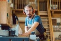 Carpenter working at the circular cutter Royalty Free Stock Photo