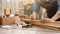 Carpenter working with equipment on wooden table Royalty Free Stock Photo