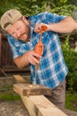 Carpenter working by hand drill Royalty Free Stock Photo