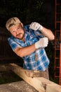 Carpenter working by hand drill Royalty Free Stock Photo