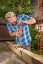 Carpenter working by hand drill Royalty Free Stock Photo