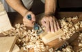 carpenter working with his bare hands wood. High quality photo