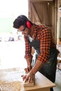 Carpenter working on his craft Royalty Free Stock Photo