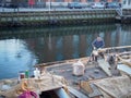 Carpenter working on the mast in Nyhavn Harbour