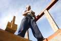 Carpenter working with nails and a wooden box Royalty Free Stock Photo