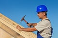 Carpenter working on the roof