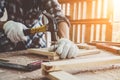 Carpenter working on wood craft at workshop Royalty Free Stock Photo