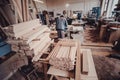 A carpenter works on woodworking the machine tool. Carpenter working on woodworking machines in carpentry shop. Royalty Free Stock Photo