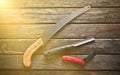 A carpenter& x27;s working tool on a wooden table. Saw, dimes, knife, top view. Royalty Free Stock Photo