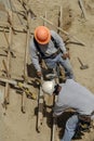 Carpenters building wood forms