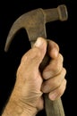 Carpenters Hand and Hammer. Royalty Free Stock Photo