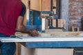 Carpenters using circular saw in workshop Royalty Free Stock Photo