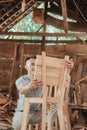 Carpenters work making chairs and installing wooden chair backs