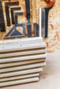 Carpenters workshop interior with wooden planks and work tools of the trade Royalty Free Stock Photo