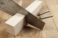 Carpenting hobby background - saw, screws and wood Royalty Free Stock Photo