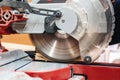 Carpentry machine circular saw cuts a board in carpentry workshop Royalty Free Stock Photo