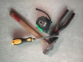 carpentry tools, including: hammers, screwdrivers and others