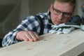 Carpentry. Wood sanding. Orbital sander for woodworking. Royalty Free Stock Photo