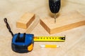 Carpentry work. The process of drilling a hole in a wooden board. Close-up. Selective focus Royalty Free Stock Photo
