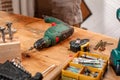 Carpentry workshop drill and other tools lie on the table Royalty Free Stock Photo
