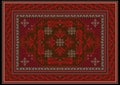 Carpet with ethnic ornament of red and burgundy shades and red floral pattern on brown on the middle