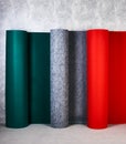 Carpet rolls in different colors in the store