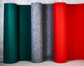 Carpet rolls in different colors in the store