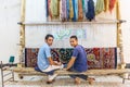 Student weavers at a carpet and tapestry weaving school