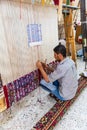 Student weavers at a carpet and tapestry weaving school