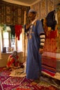 Carpet trade  in Kasbah Ait Ben Haddou  in the Atlas Mountains, Morocco. Royalty Free Stock Photo
