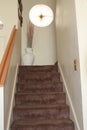 Carpeted stairs in home Royalty Free Stock Photo