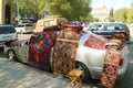 Carpets for Sale Displayed on the Car at Vernissage Market in Yerevan, Armenia Royalty Free Stock Photo