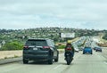 Carpool lane ahead - sign on large overhead signage informs drivers about distance to high-occupancy vehicle lane