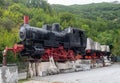 CARRARA, ITALY - AUGUST 23, 2019: Old locomotive, train engine, near the marble quarries at Fantiscritti, Carrara. Once