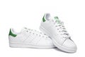 Pair of Adidas Stan Smith sneaker classic white and green isolated on white background